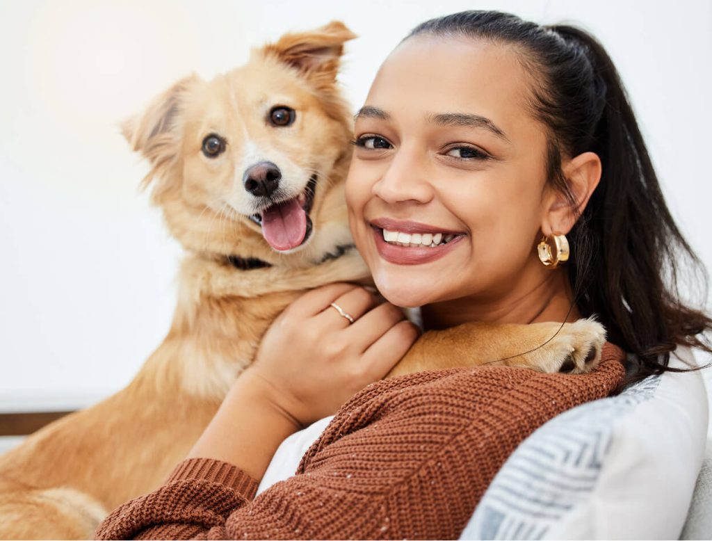 Woman holding Dog